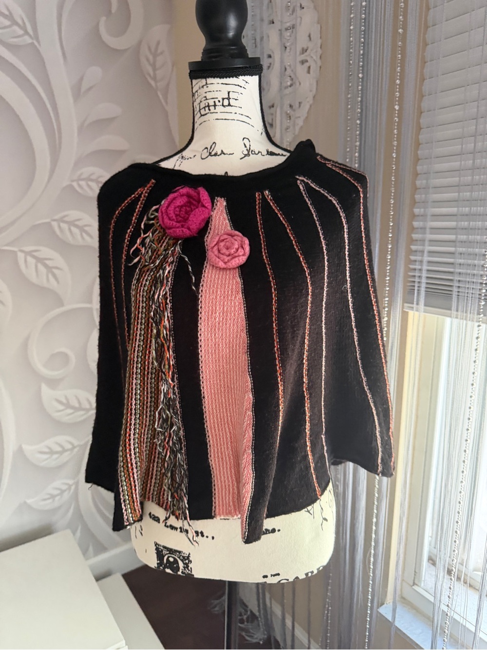 BCBGMaxAzria Black Shrug with Pink Contrast Panels and Rosette Accents